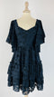 Abito corto in pizzo blu con cartellino