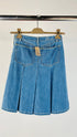Gonna corta a pieghe in denim