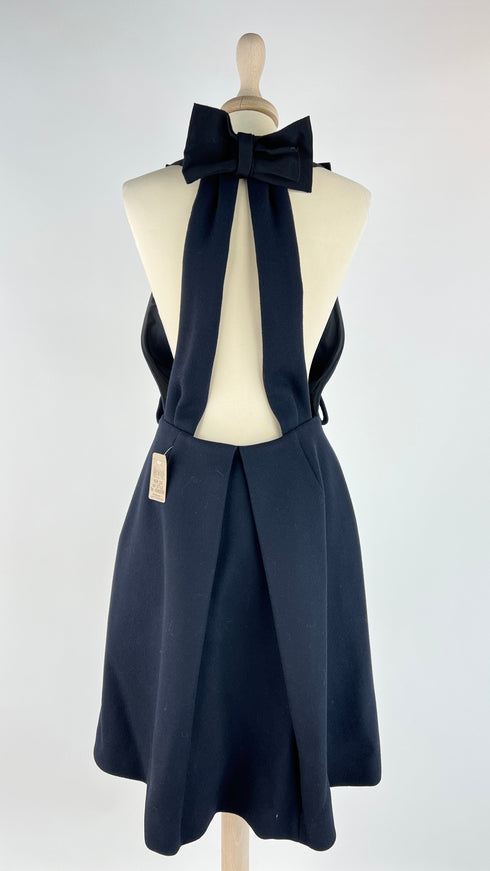 Abito in lana con cartellino