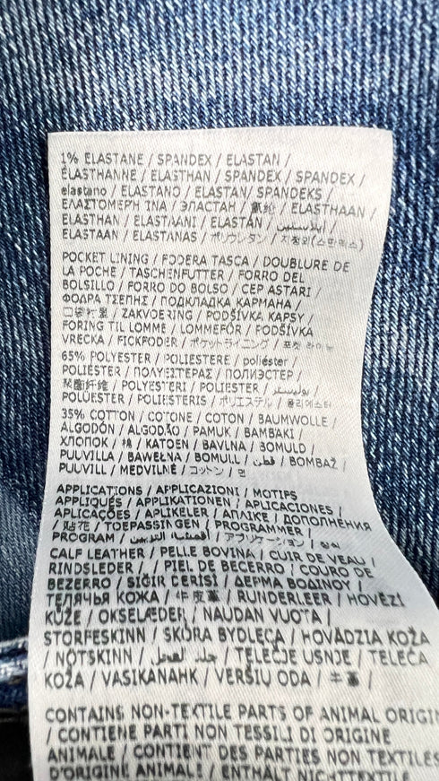 Jeans con patch a fiori