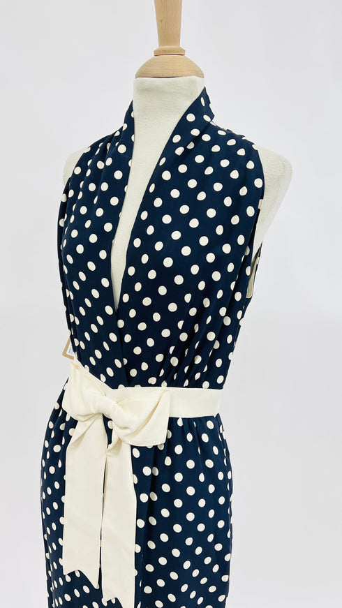 Abito corto a pois con fiocco