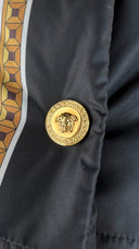 Piumino barocco logo Versace