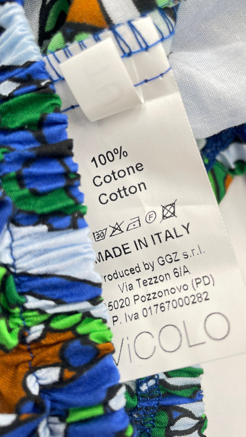 Top cropped con cartellino