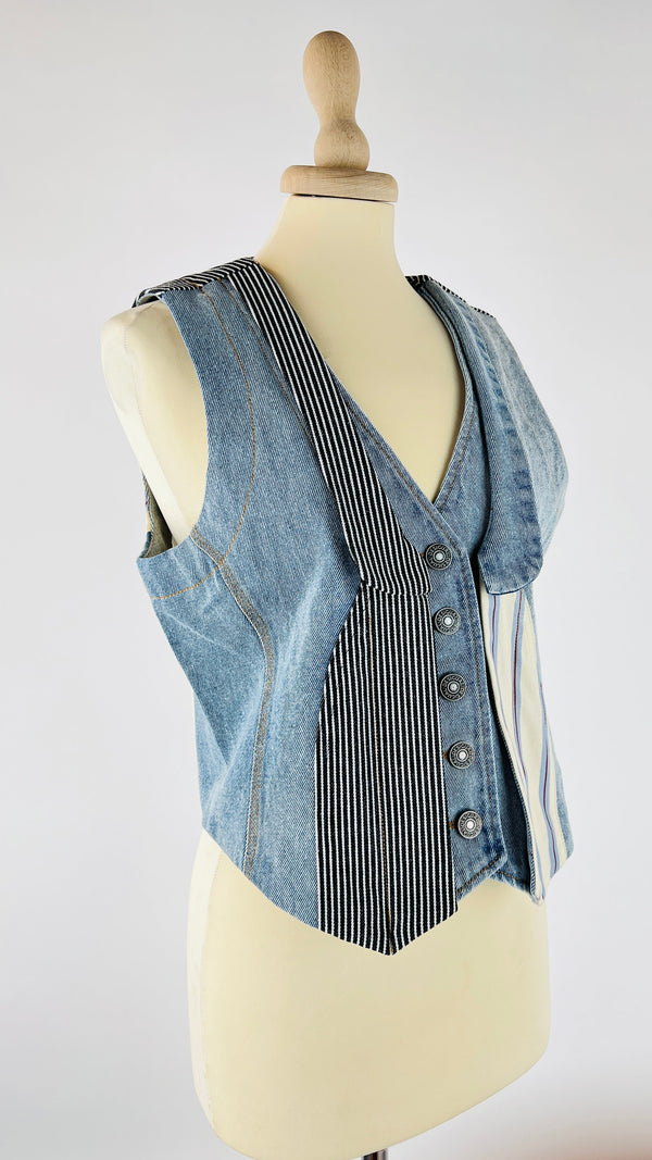 Gilet in denim con cartellino