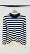 Maglione a righe bianche e navy