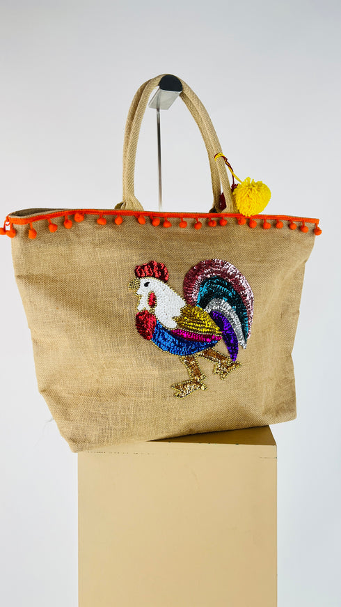 Borsa con appliqués e cartellino