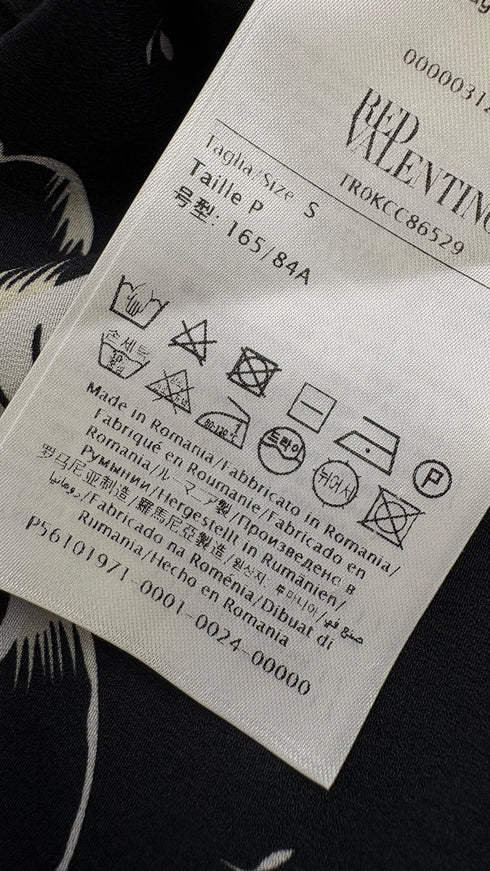 Maglia nera con fiocco