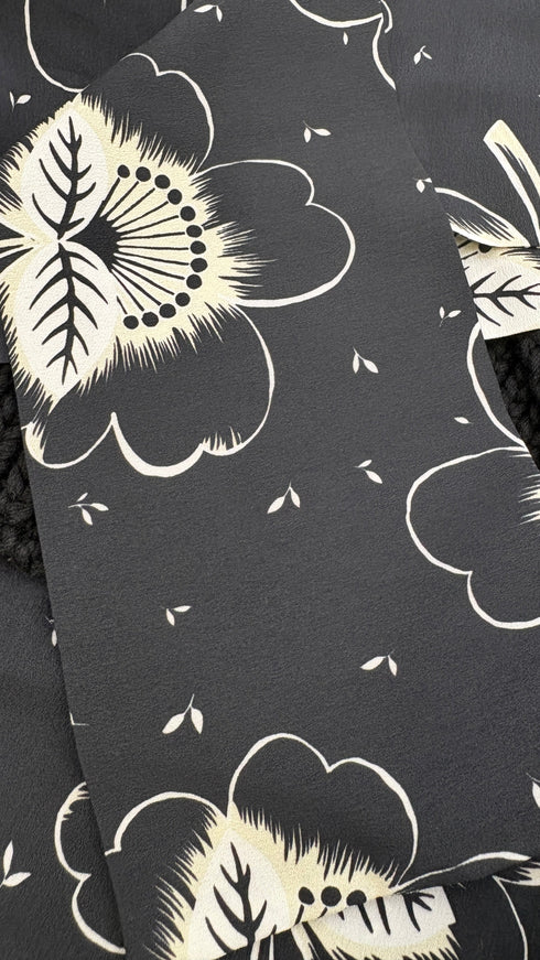 Maglia nera con fiocco