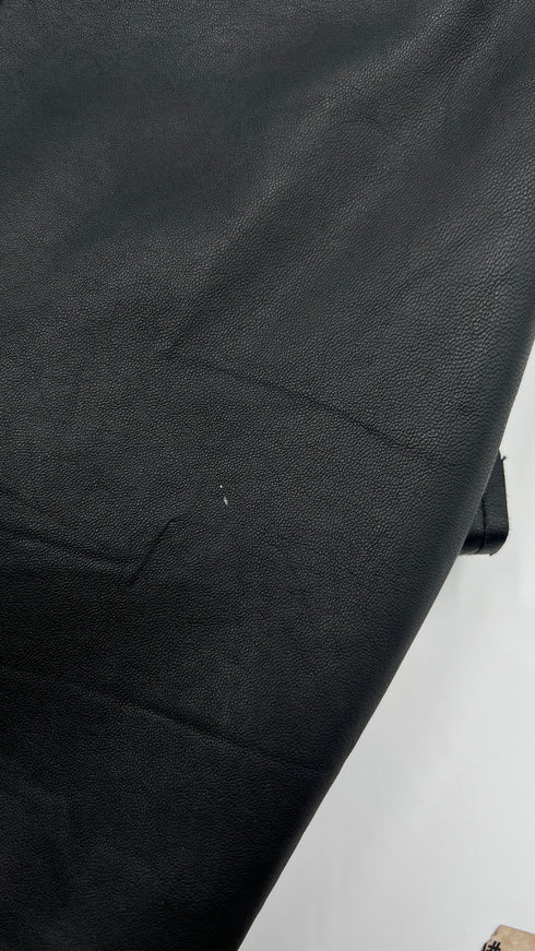 Abito smanicato in pelle