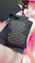 Abito corto con cartellino