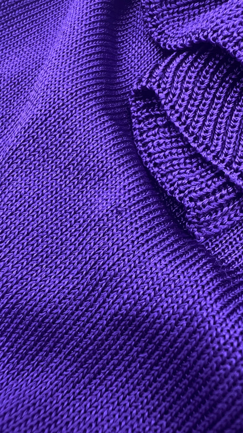 Top in maglia con volant