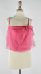 Top elegante con cartellino