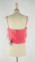 Top elegante con cartellino