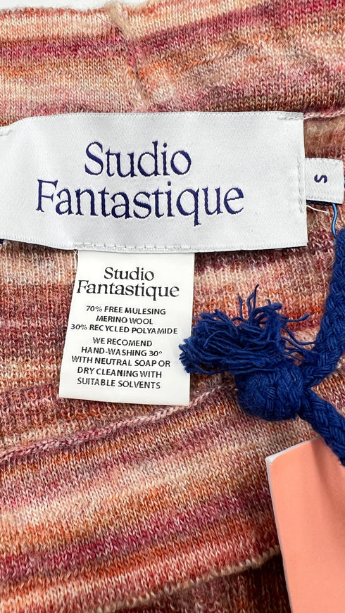 Completo in maglia con cartellino