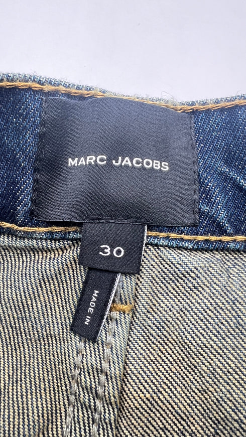 Jeans a gamba larga con cartellino