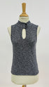 Top in maglia con cartellino