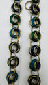 Collana statement con anelli in metallo e legno smaltato