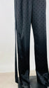 Completo nero in tessuto jacquard satinato