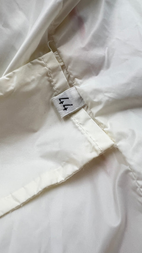 Piumino inserto pelle con cartellino