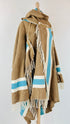 Poncho oversized con frange