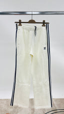 Pantaloni joggers con cartellino Adidas