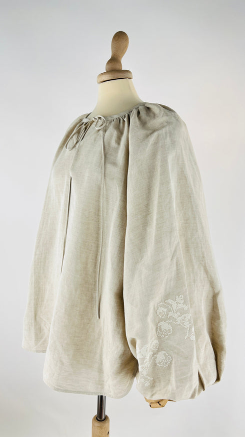 Blusa maniche a sbuffo