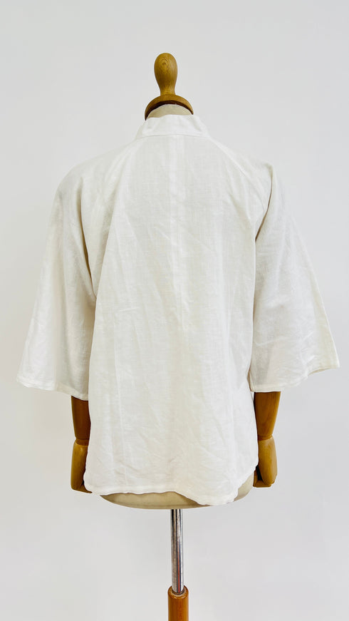 Camicia abbottonatura asimmetrica