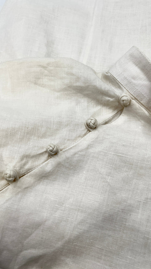 Camicia abbottonatura asimmetrica