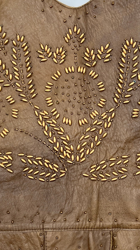 Gilet in pelle con perline