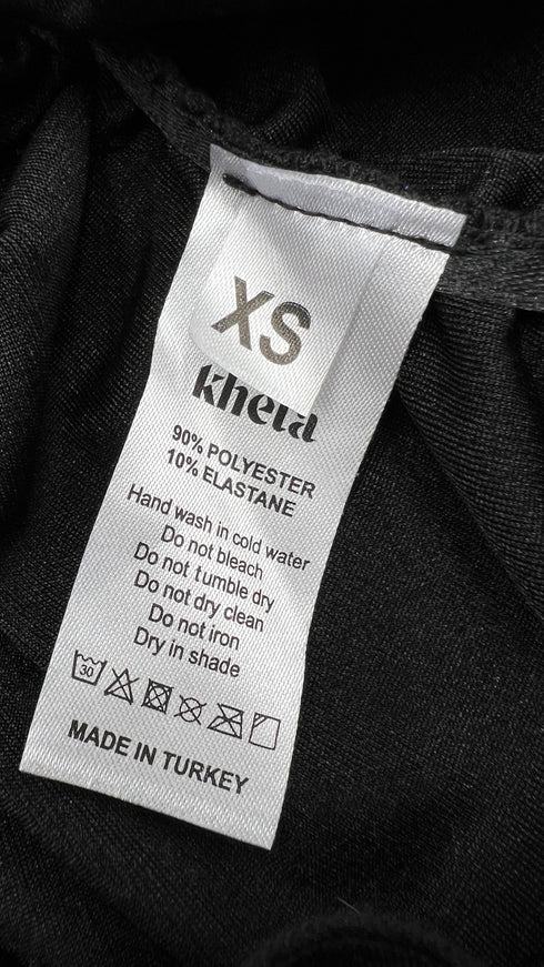 Top lurex viola con cartellino