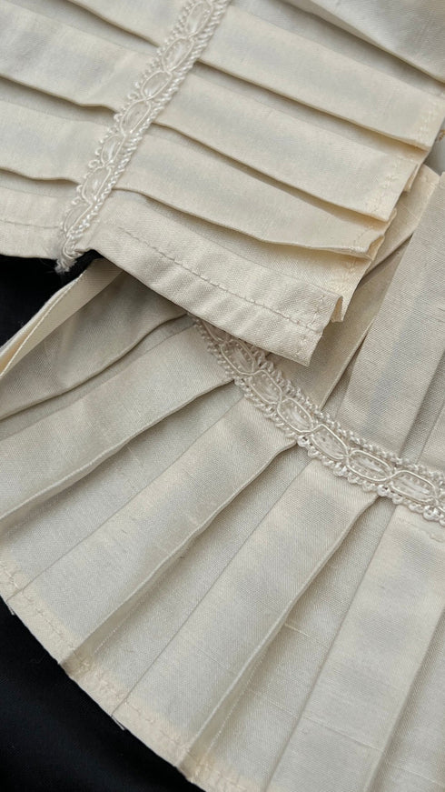 Gilet con collo plissé