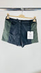 Shorts bicolor Capsule "Born to Protect" con cartellino