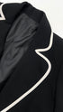 Blazer nero profili bianchi