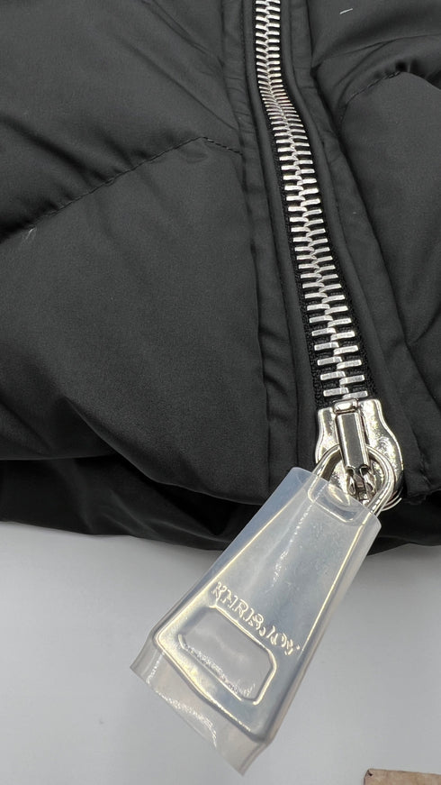 Piumino "Iconic" con cartellino