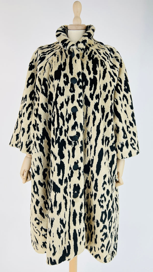 Faux fur animalier con cartellino