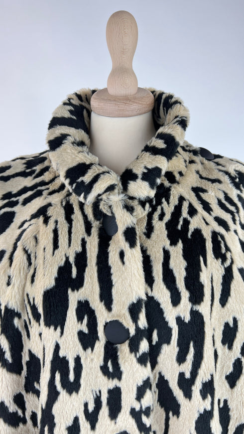 Faux fur animalier con cartellino