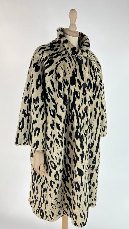 Faux fur animalier con cartellino