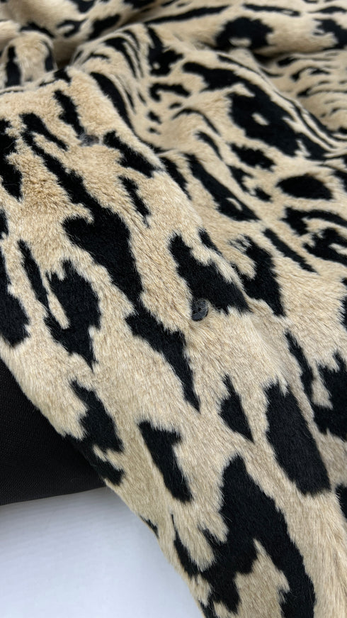 Faux fur animalier con cartellino