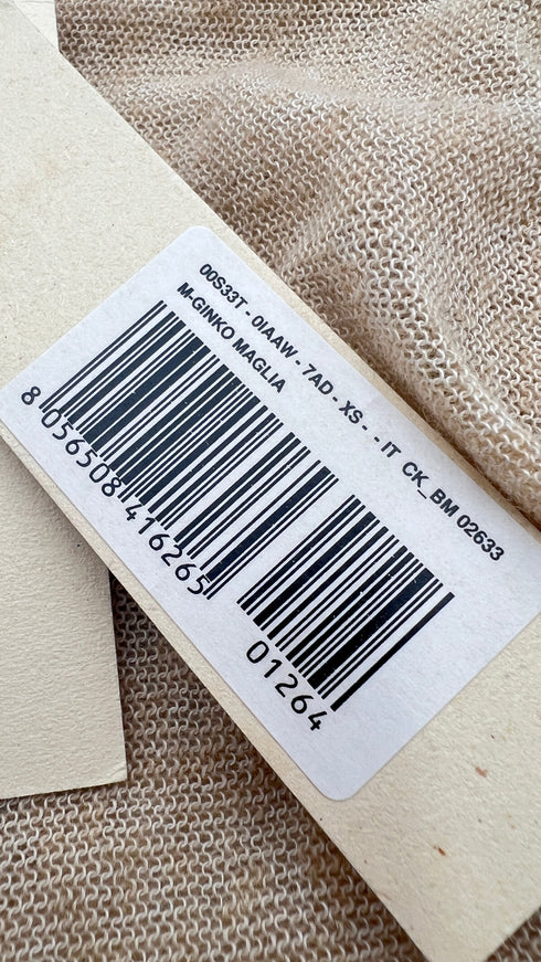 Cardigan lungo con cartellino