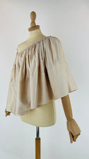 Top monospalla con cartellino Solace london