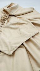 Top monospalla con cartellino Solace london