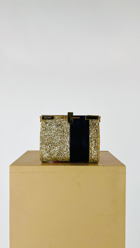 Clutch glitterata dorata con inserto in pelle