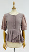 Blusa in seta a balze