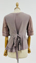 Blusa in seta a balze
