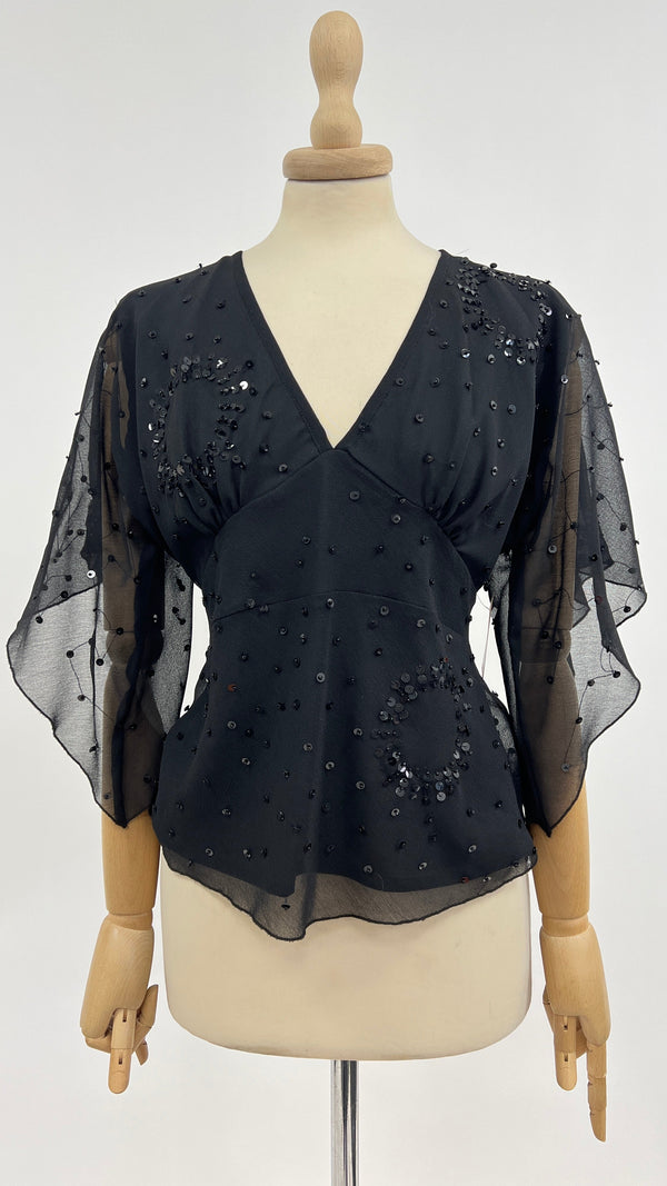 Blusa con paillettes