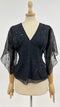 Blusa con paillettes