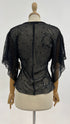 Blusa con paillettes