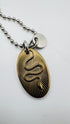 Collana con ciondolo serpente