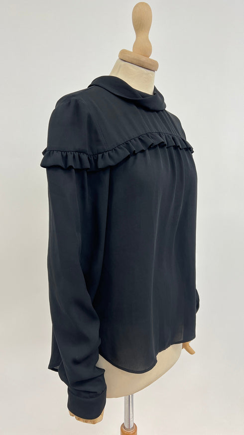 Blusa con balza