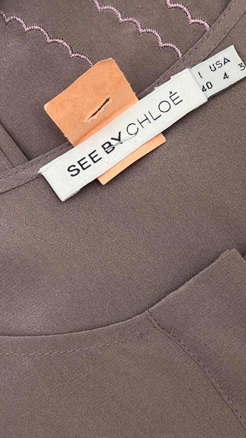 Blusa in seta a balze